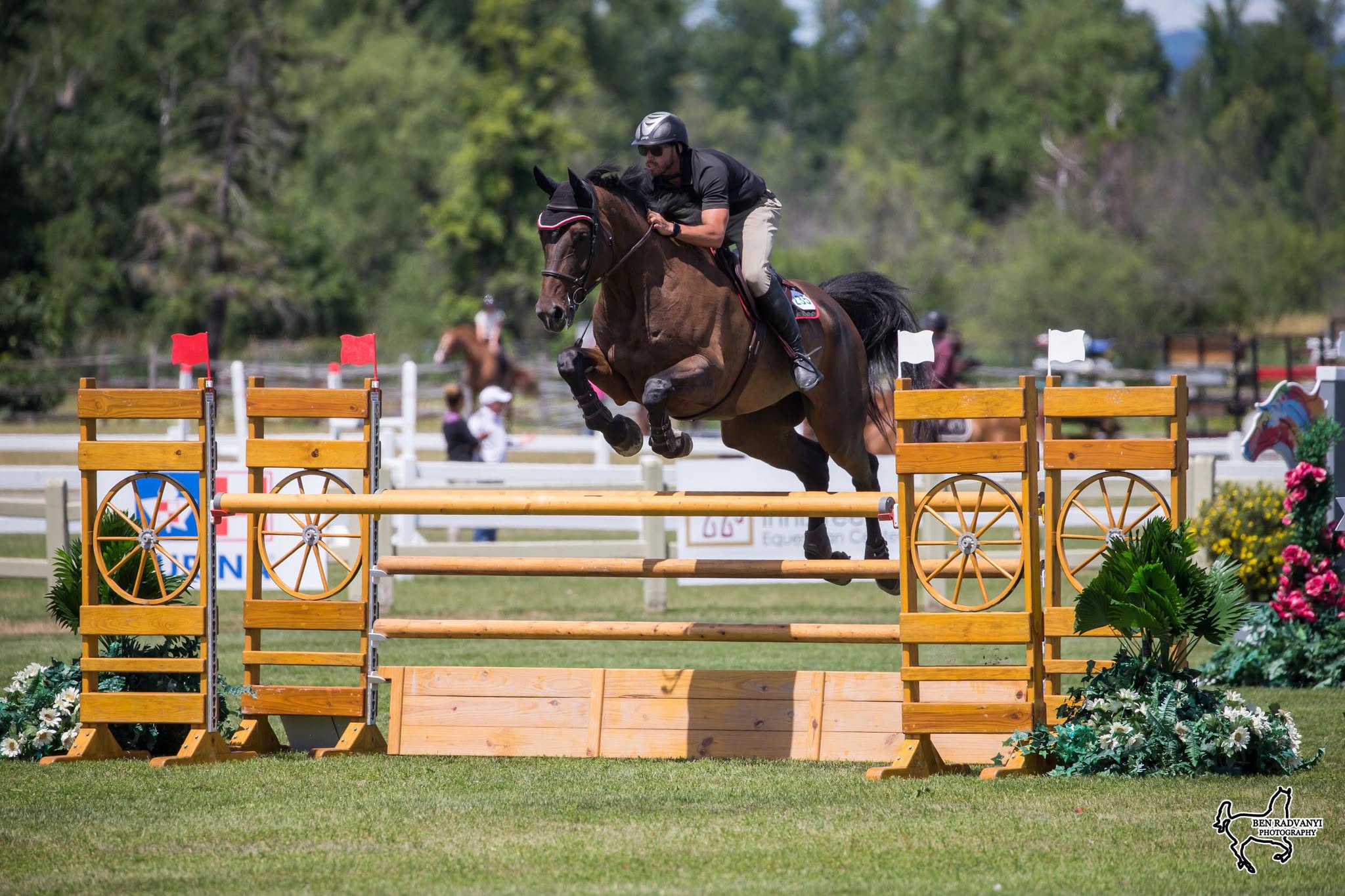 a man lying on a bed with a woman lying on the bed