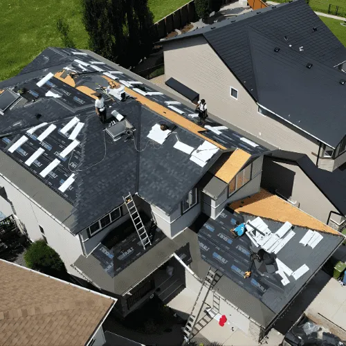 Calgary roofing contractors working on a home