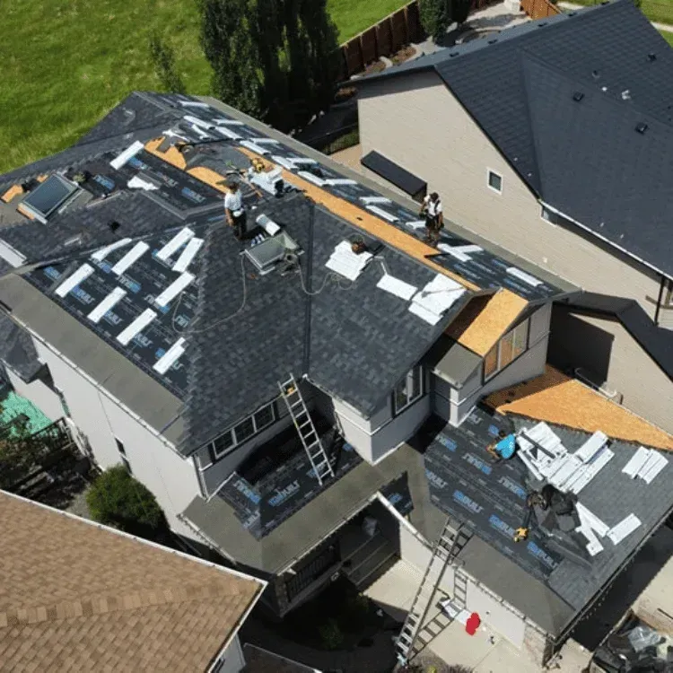 Calgary roofing contractors working on a home