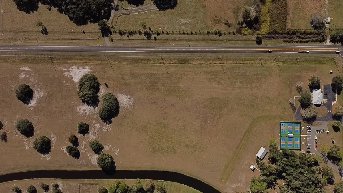Modern houses on a hillside overlooking the water