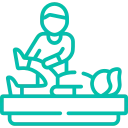 A trainer performing leg physiotherapy to a patient in Vancouver, Surrey & Langley
