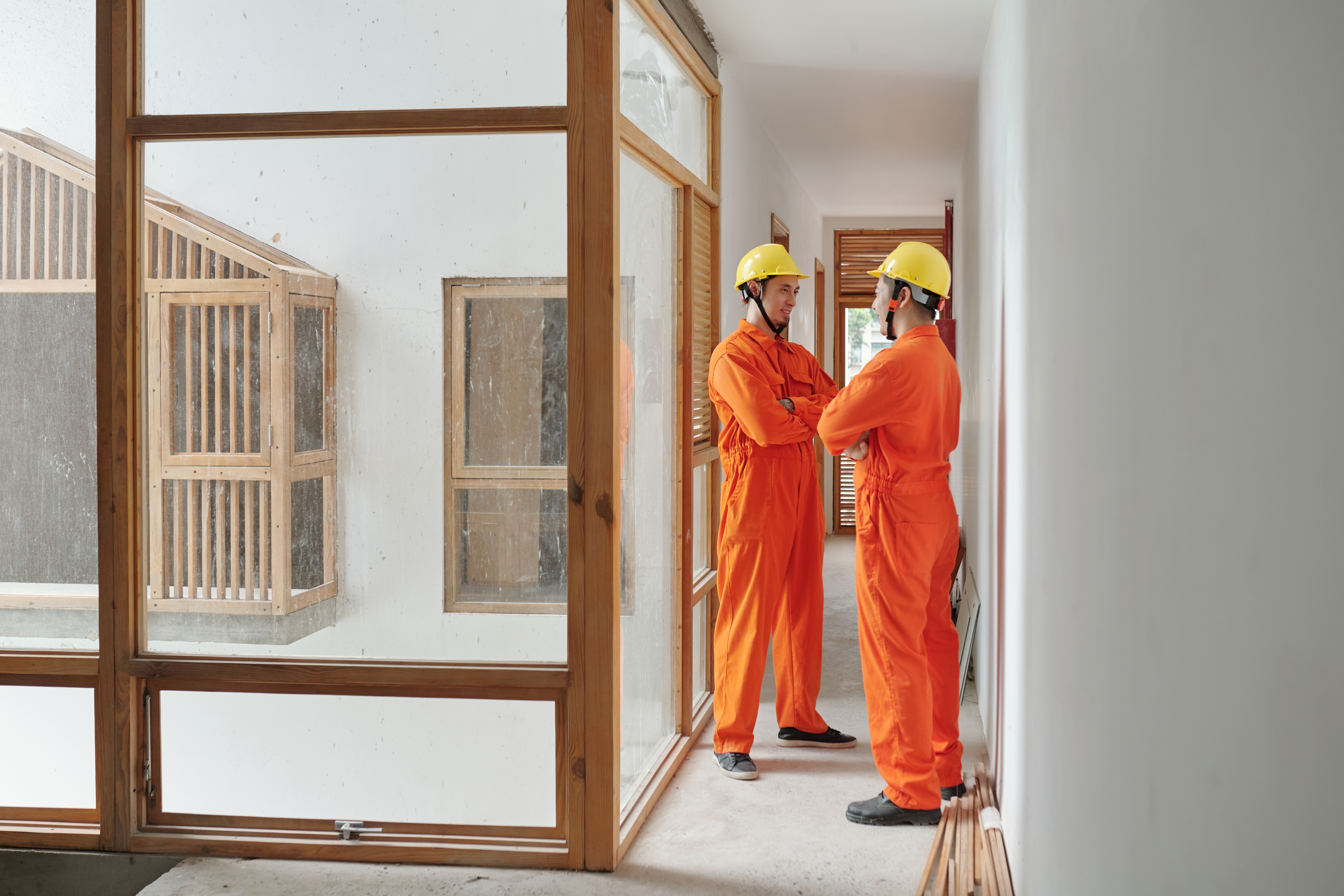 Engineer Going Through Plan With Customer - Ridgeway Structures
