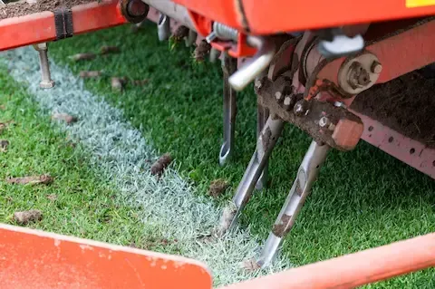 Core lawn aeration service by Bloomington Lawn & Snow