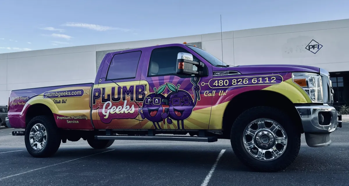Plumbing van in front of residential home.