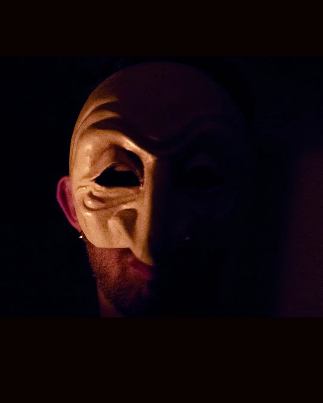 Actors in vibrant costumes mid-performance