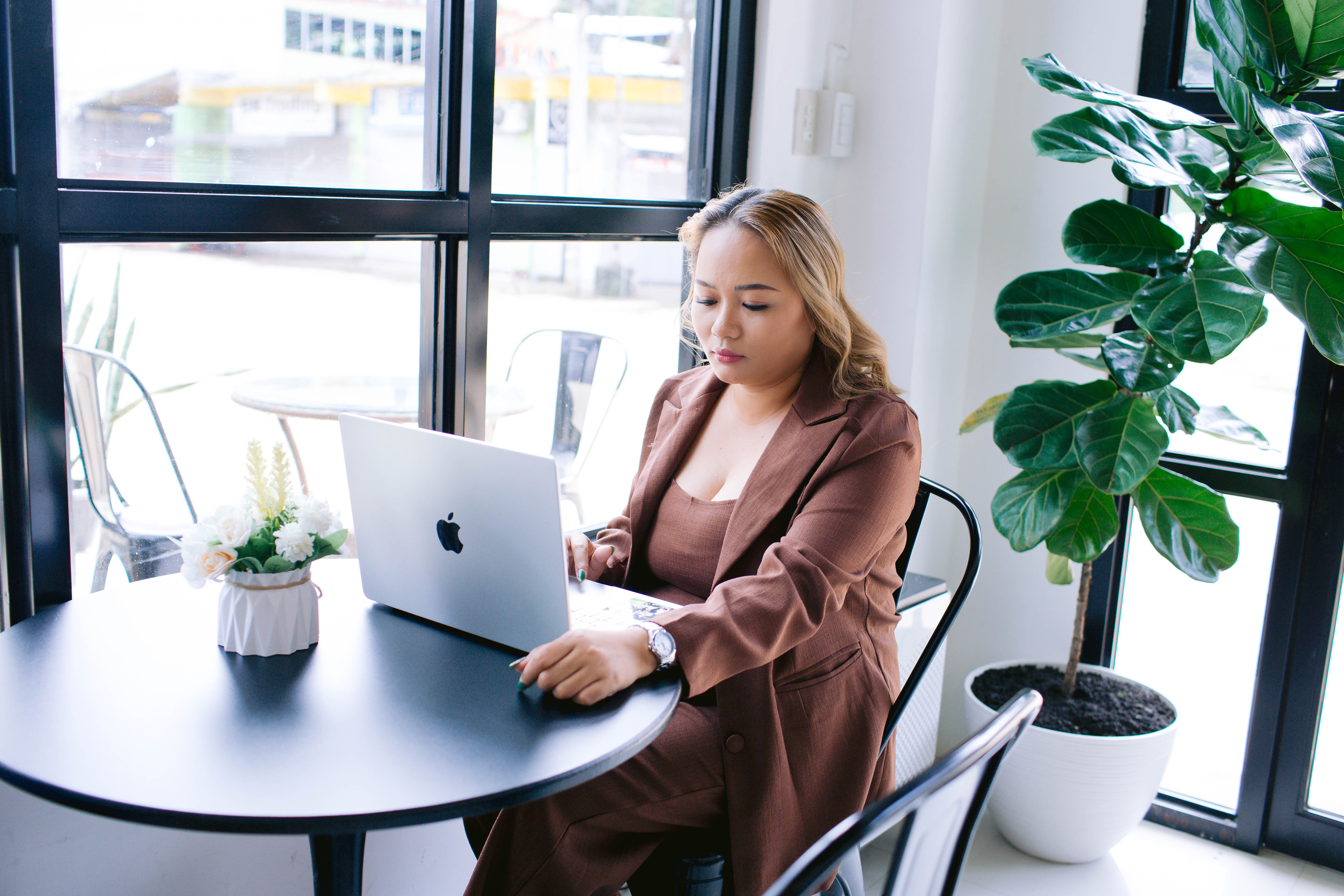 Basketball players competing for the ball on court.