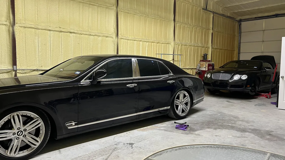 Two Bentleys getting repaired