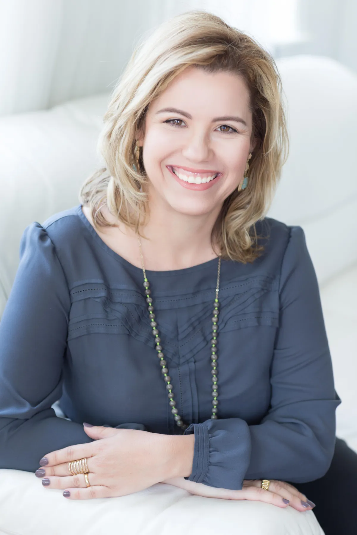 Therapist Sabrina Bowen in a professional headshot representing her work helping couples reduce conflict and communicate more effectively.