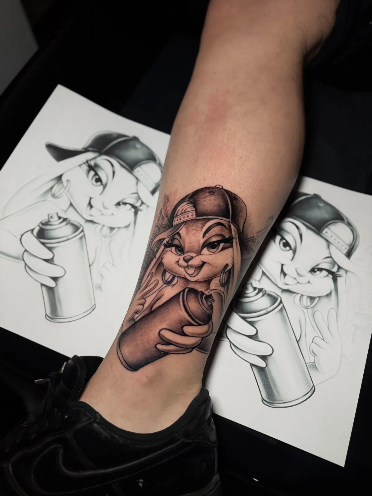 person with tattoo on right arm