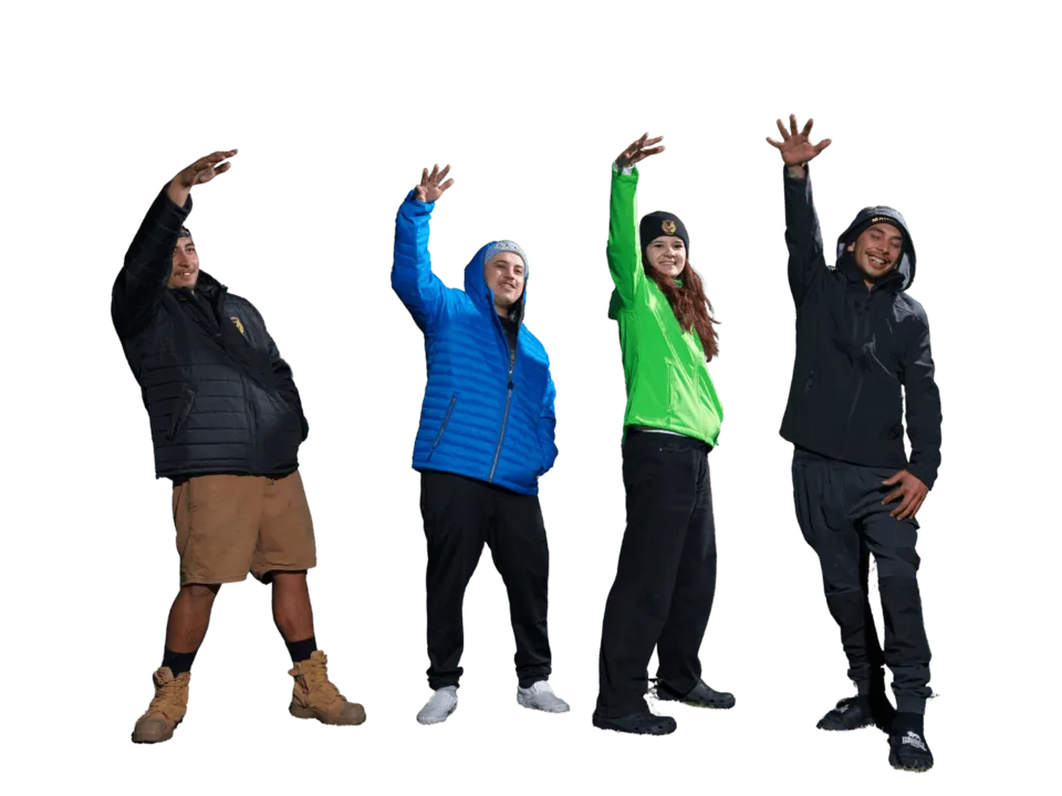 Four young adult models wearing winter jackets doing the mana wave