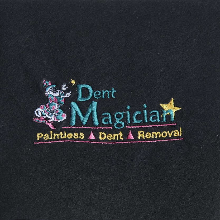 Colourful Dent Magician Paintless Dent Removal logo embroidered on black fabric