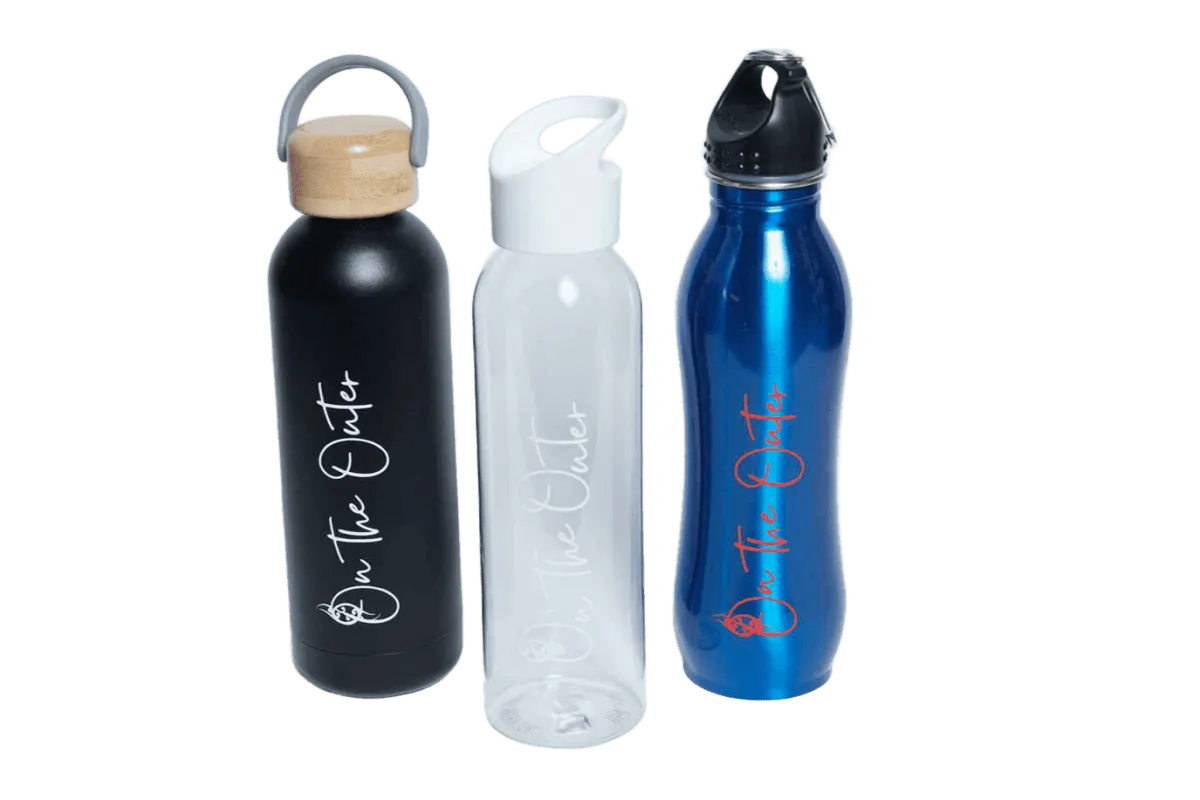 Three reusable bottles in black, white and metallic blue with On the Outer branding