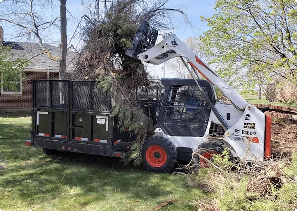 Plumber fixng leak repair under bathroom sink in San Antonio
