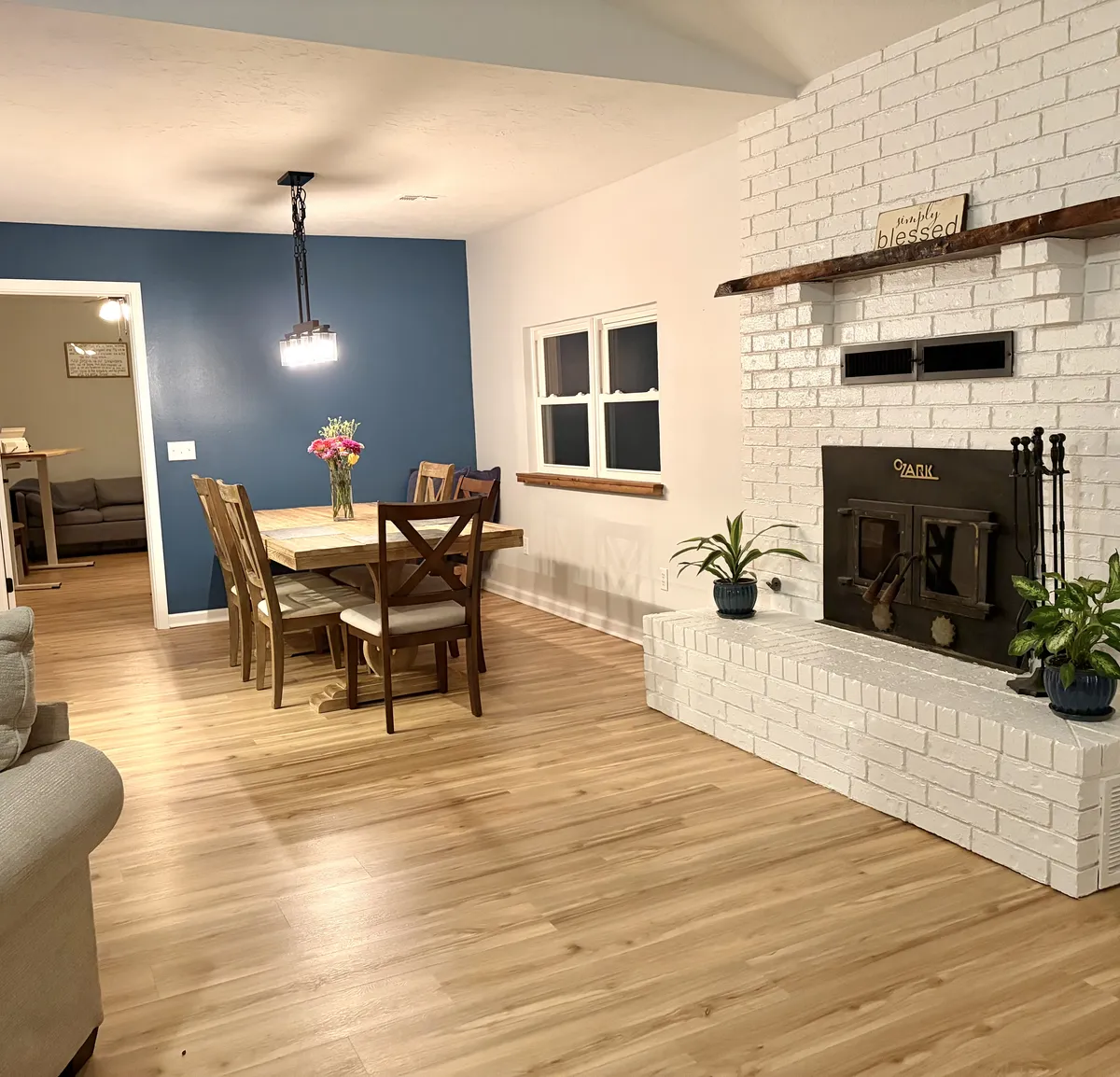 Bright renovated kitchen with shaker cabinets and granite countertops