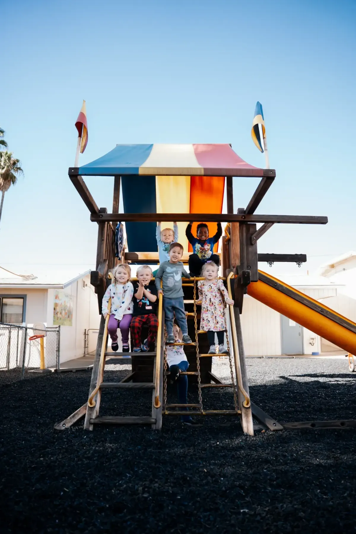 Happy children on the playground at Ready Set Grow Learning Center El Cajon