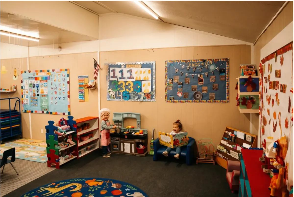 Toddlers playing and reading in a warm classroom at Ready Set Grow Learning Center El Cajon