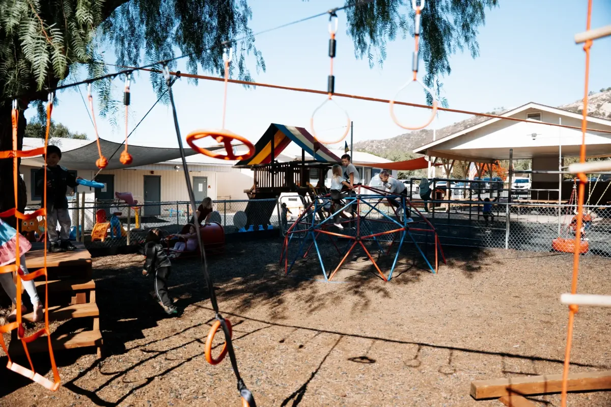 Children playing on the adventure ninja course at Ready Set Grow Learning Center El Cajon