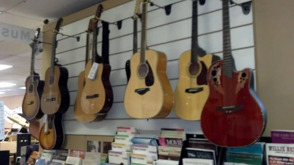 a violin with a black back and white strings