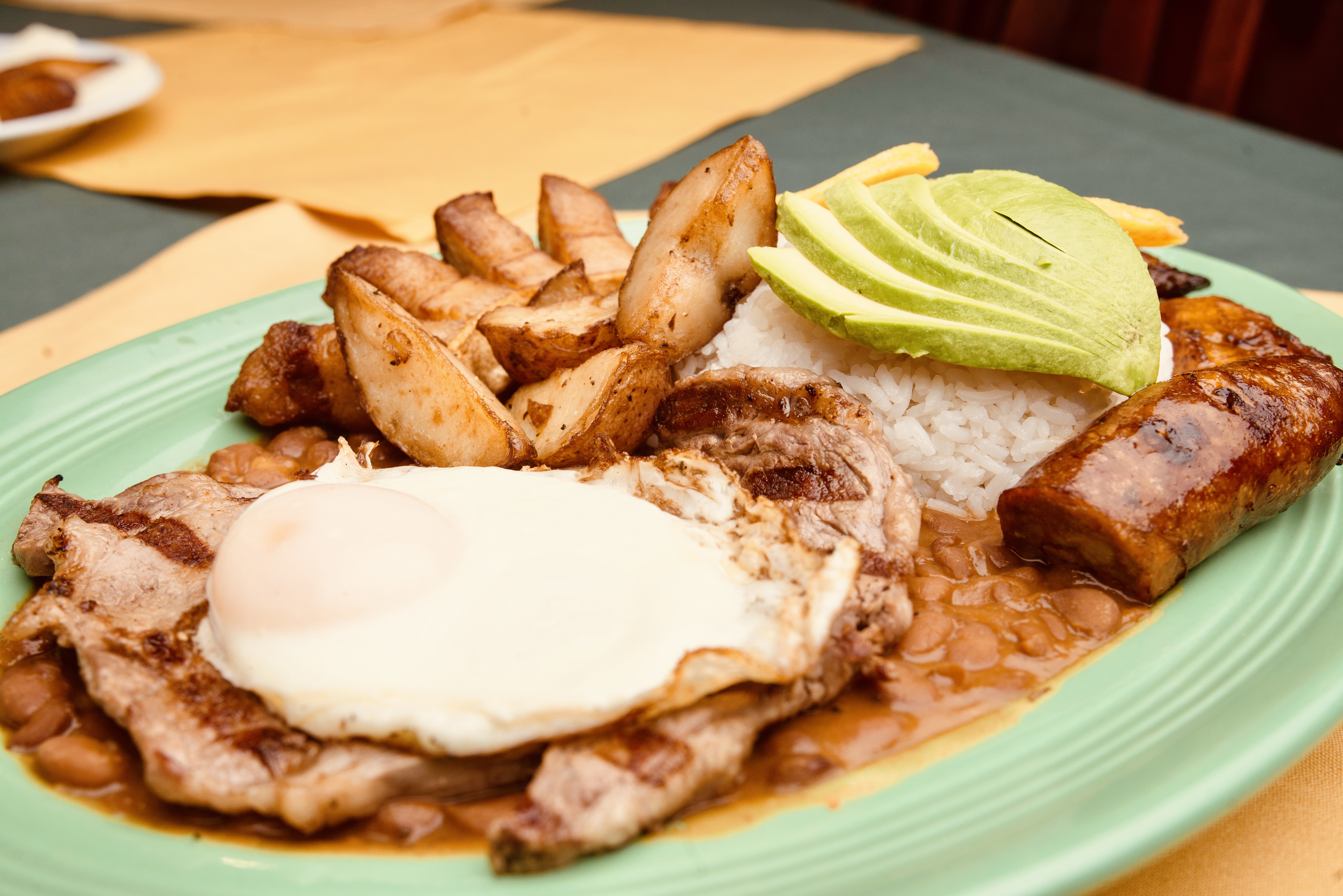 Smoky grill marks on flank steak used for fajitas, close crop showing texture and seasoning.