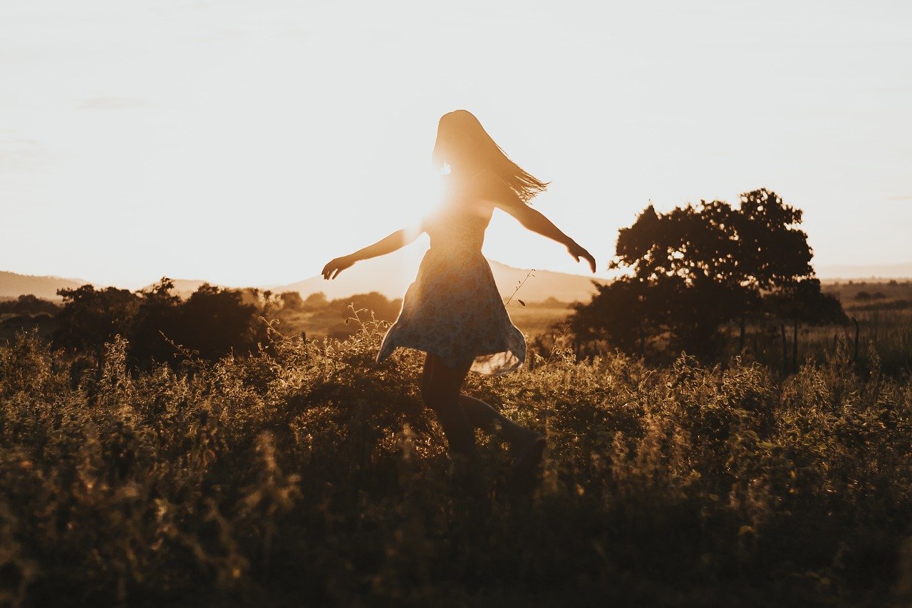 Woman rediscovering purpose confidence and freedom in a new life chapter