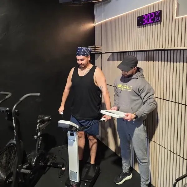 BoxingRX coach reviewing an InBody scan with a member