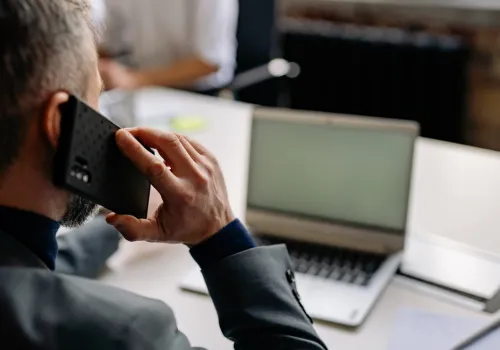 cover image - The Voice on the Phone Was Your CFO's — The Person Behind It Wasn't