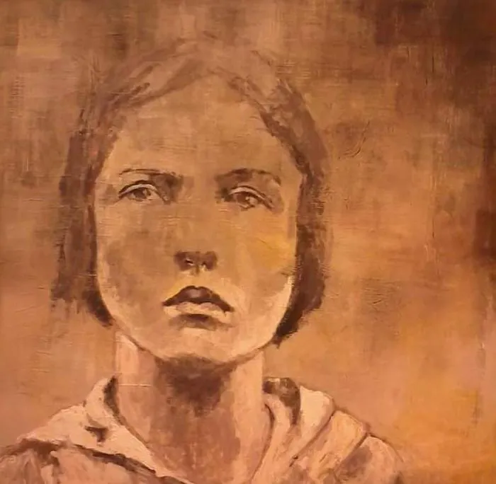 A man working on a piece of wood