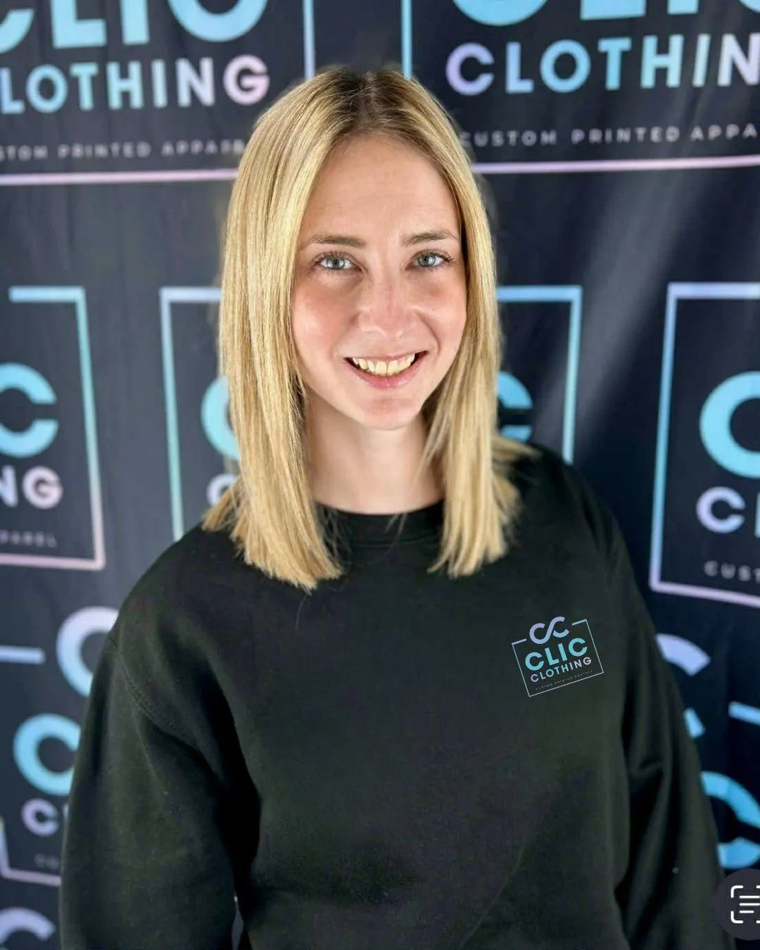 a man in a military uniform standing in front of a building
