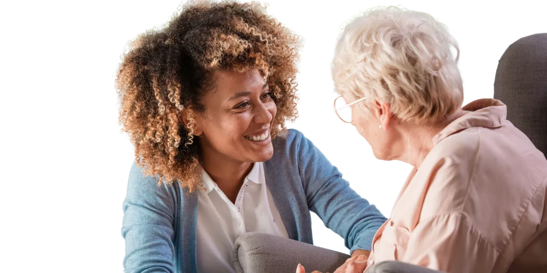 caregiver and grandma chatting