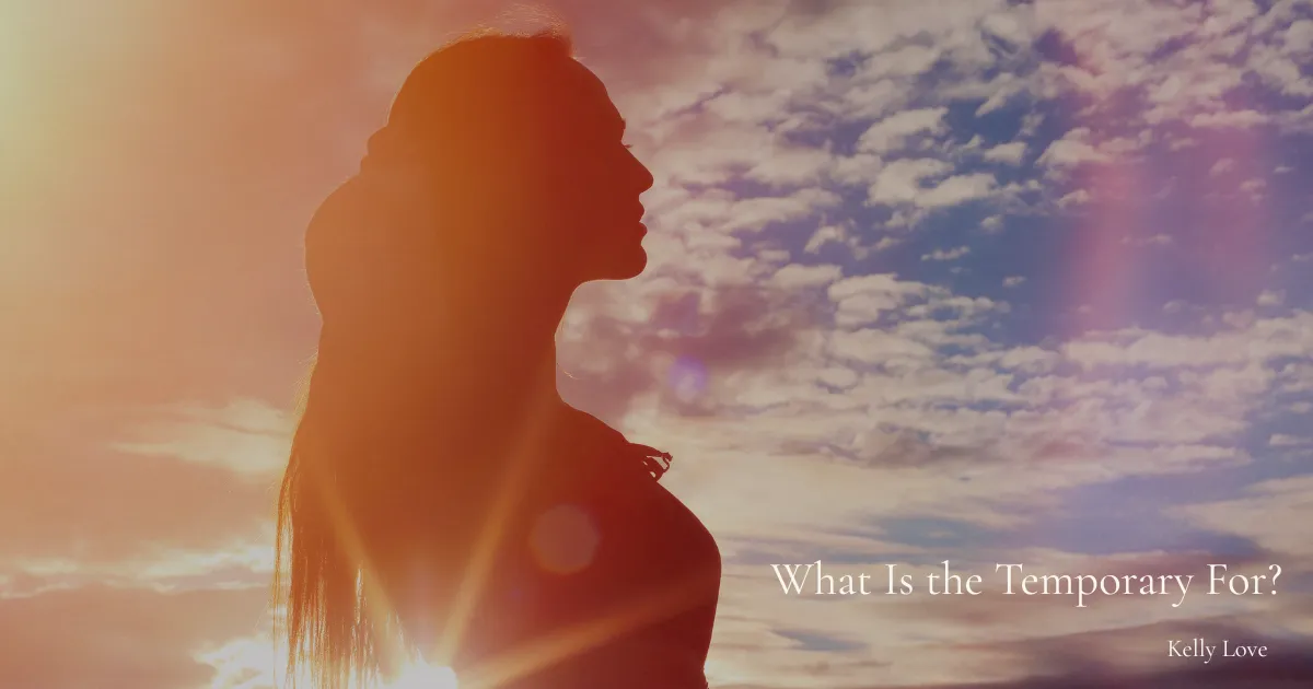 Woman silhouette against sunset sky representing consciousness in a temporary physical body