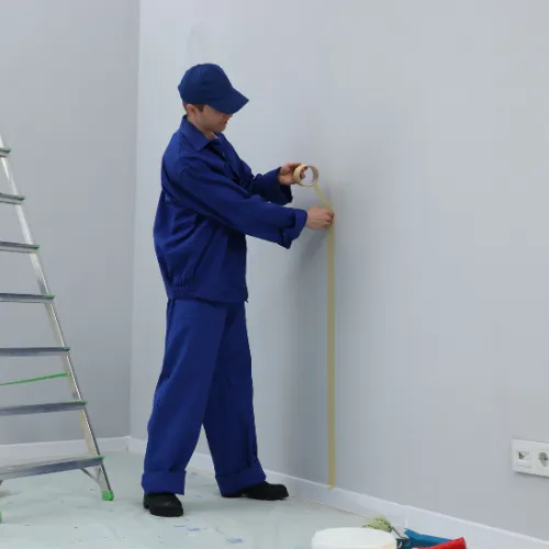 Austin Handyman wears his toolbelt.