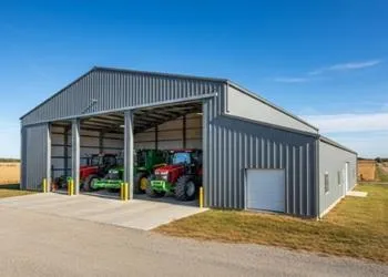 metal equipment barn with tractors inside
