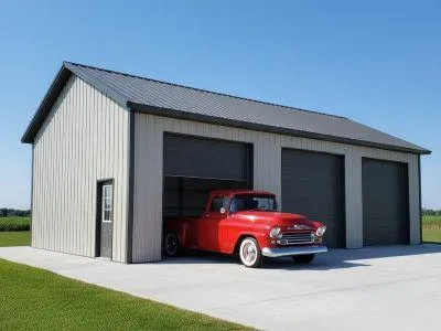 tan metal building with a walk-in door nd 3 oerhead door one with a red chevy ick up inside