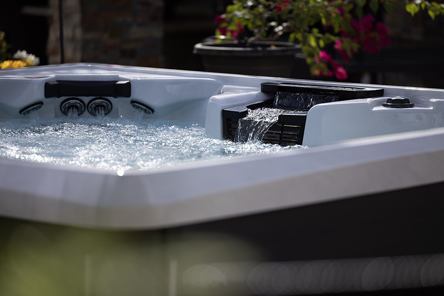 a bowl of water with a flower