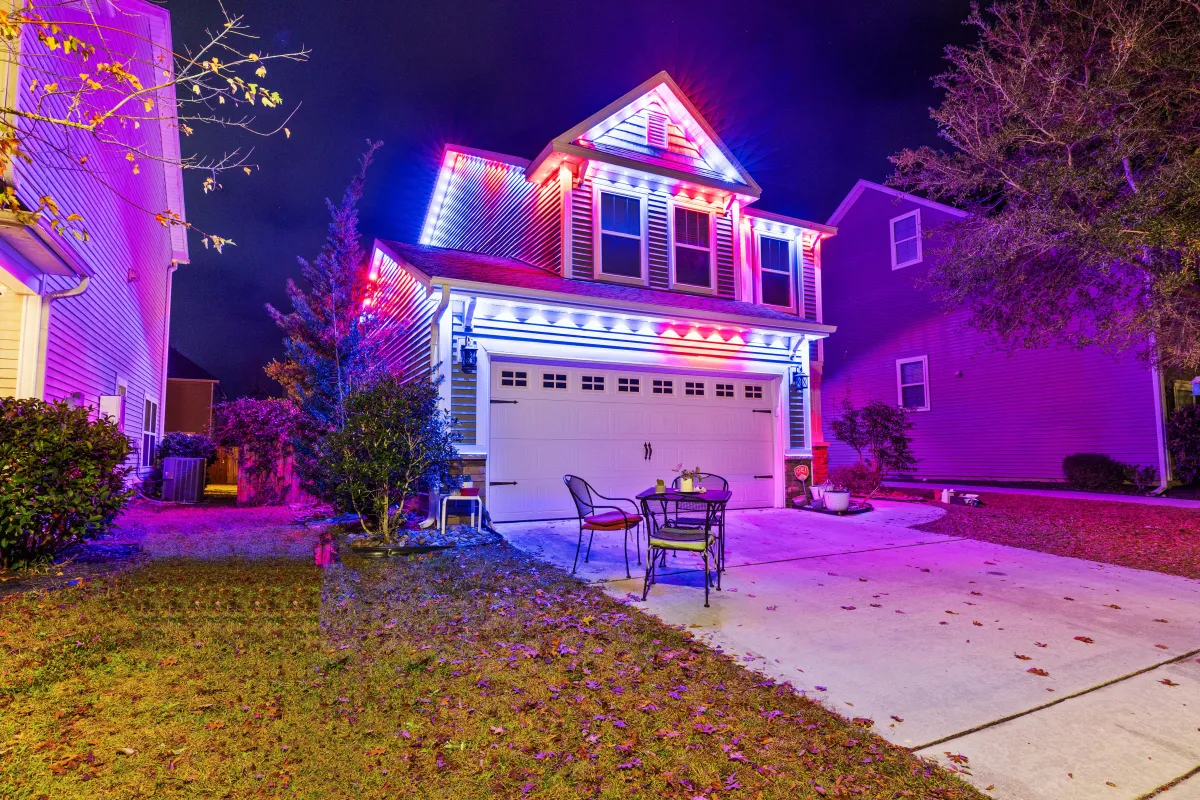 Brightly lit house showcasing EverBright Permanent Lights with customizable colors, enhancing the home’s exterior for year-round and holiday lighting.