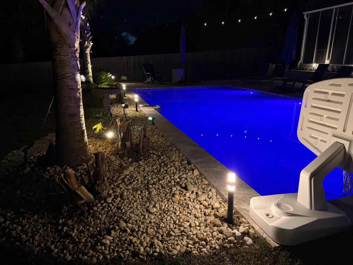 Govee outdoor landscape lighting illuminating the plants in the front yard