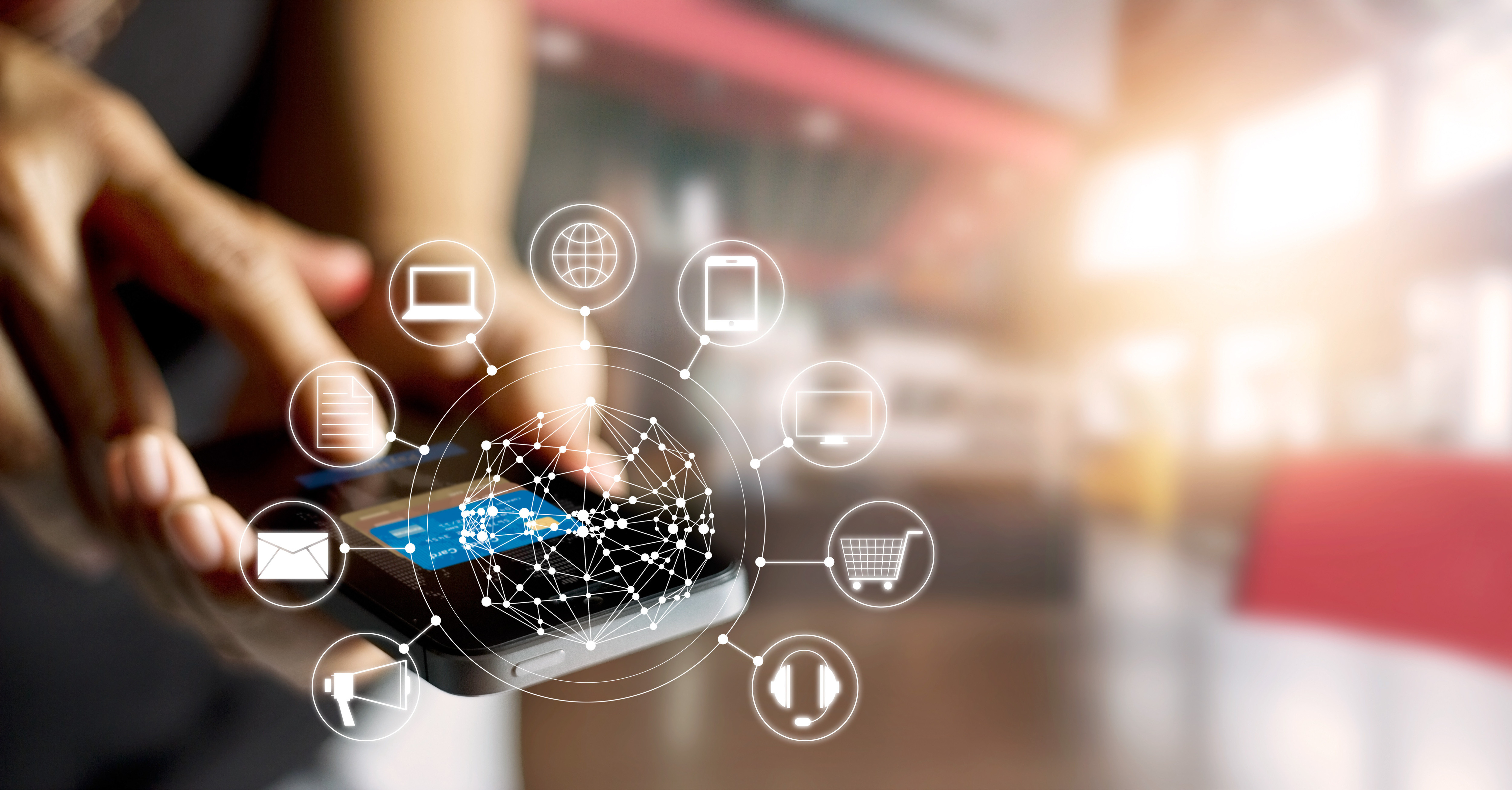 Close-up of a person using a smartphone for online shopping, with digital ecommerce icons like cart, payment, email, and marketing automation network overlay.