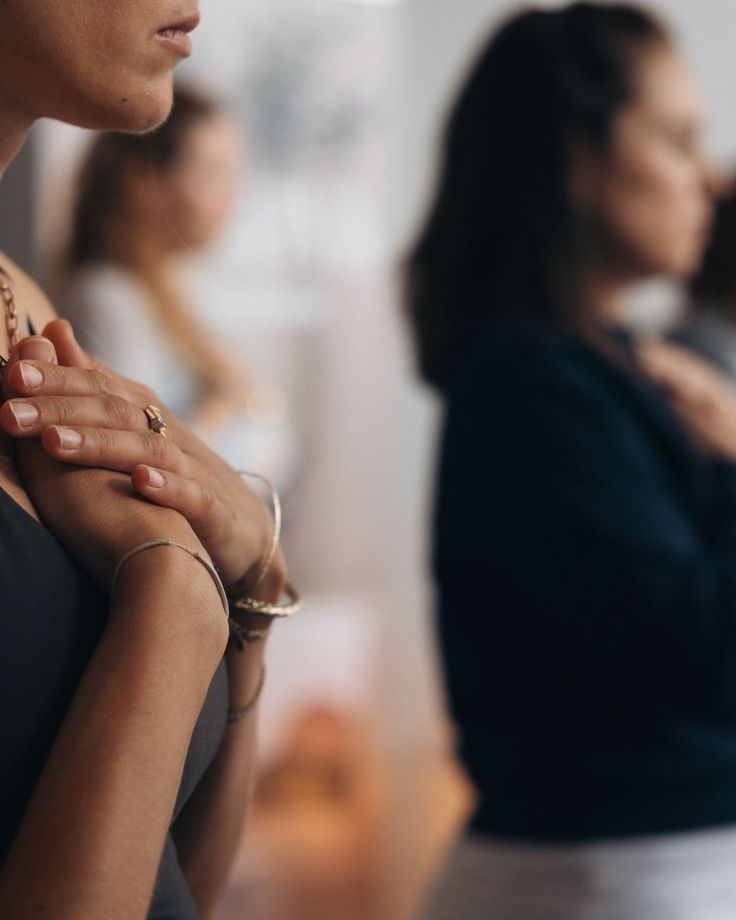 Man standing on sand dune under clear sky