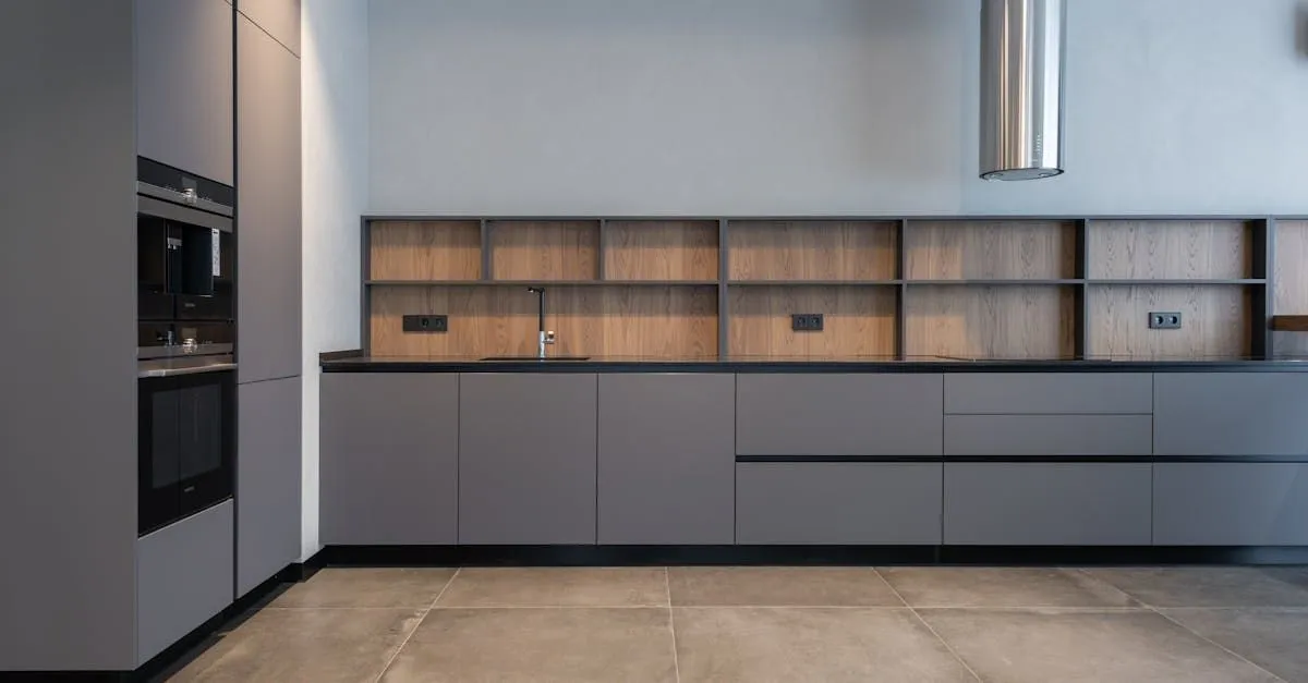 Modern kitchen with gray cabinets and wood shelves for a restaurant repair job in Lubbock, TX