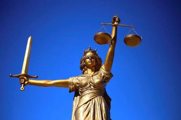 Scales of justice to show why Krav Maga Lake Norman teaches the rules of self defense