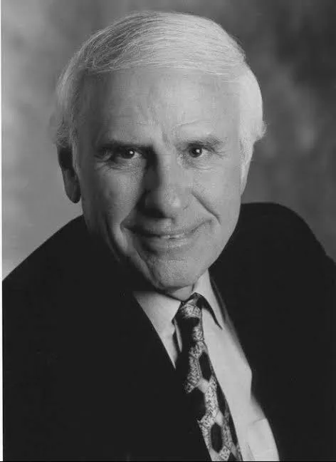Jim Rohn, the legendary business philosopher and mentor to Tony Robbins posing for a headshot.