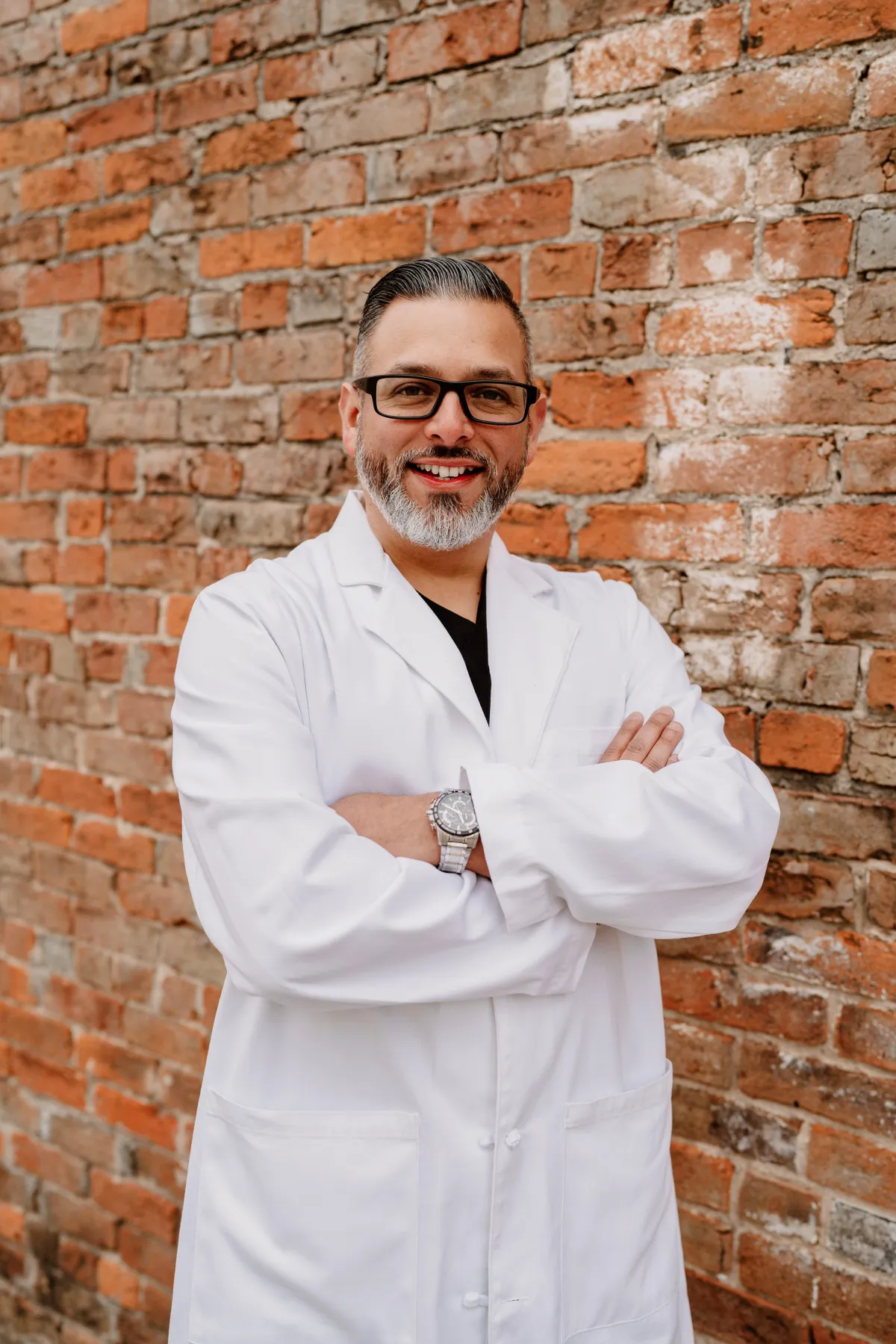 A headshot of Rudy Garza, MD, at The Aesthetic Collective in Bastrop, Texas.
