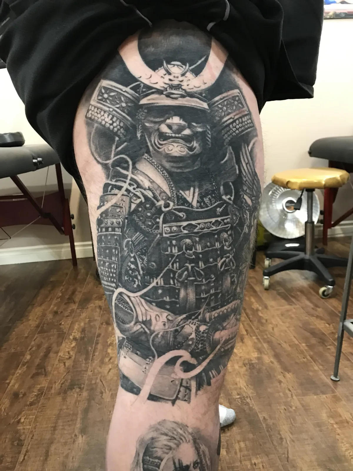 person with tattoo on right arm