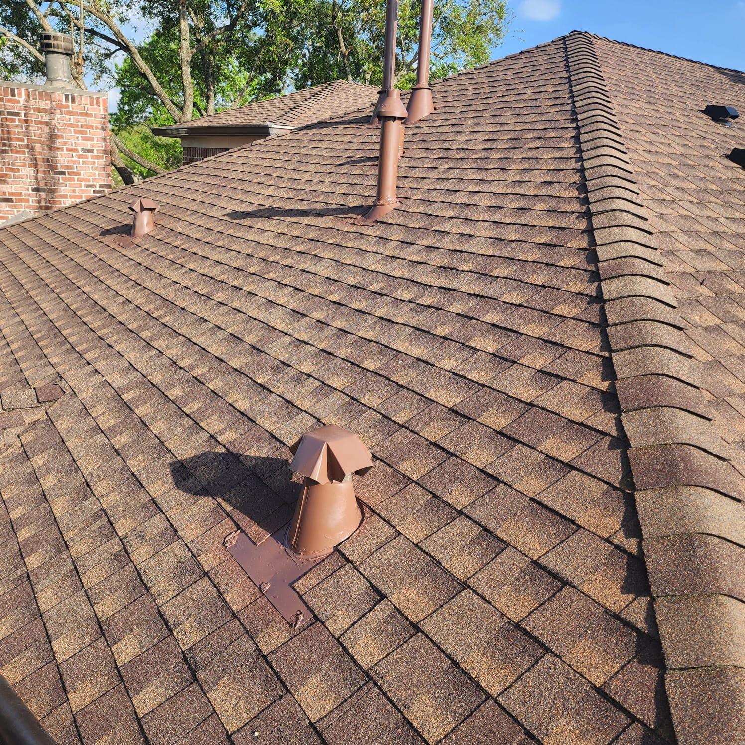 a roof with a few shingles