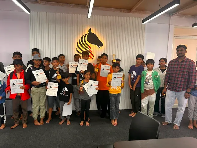 Students at CHESS KLUB with certificate on a Stage