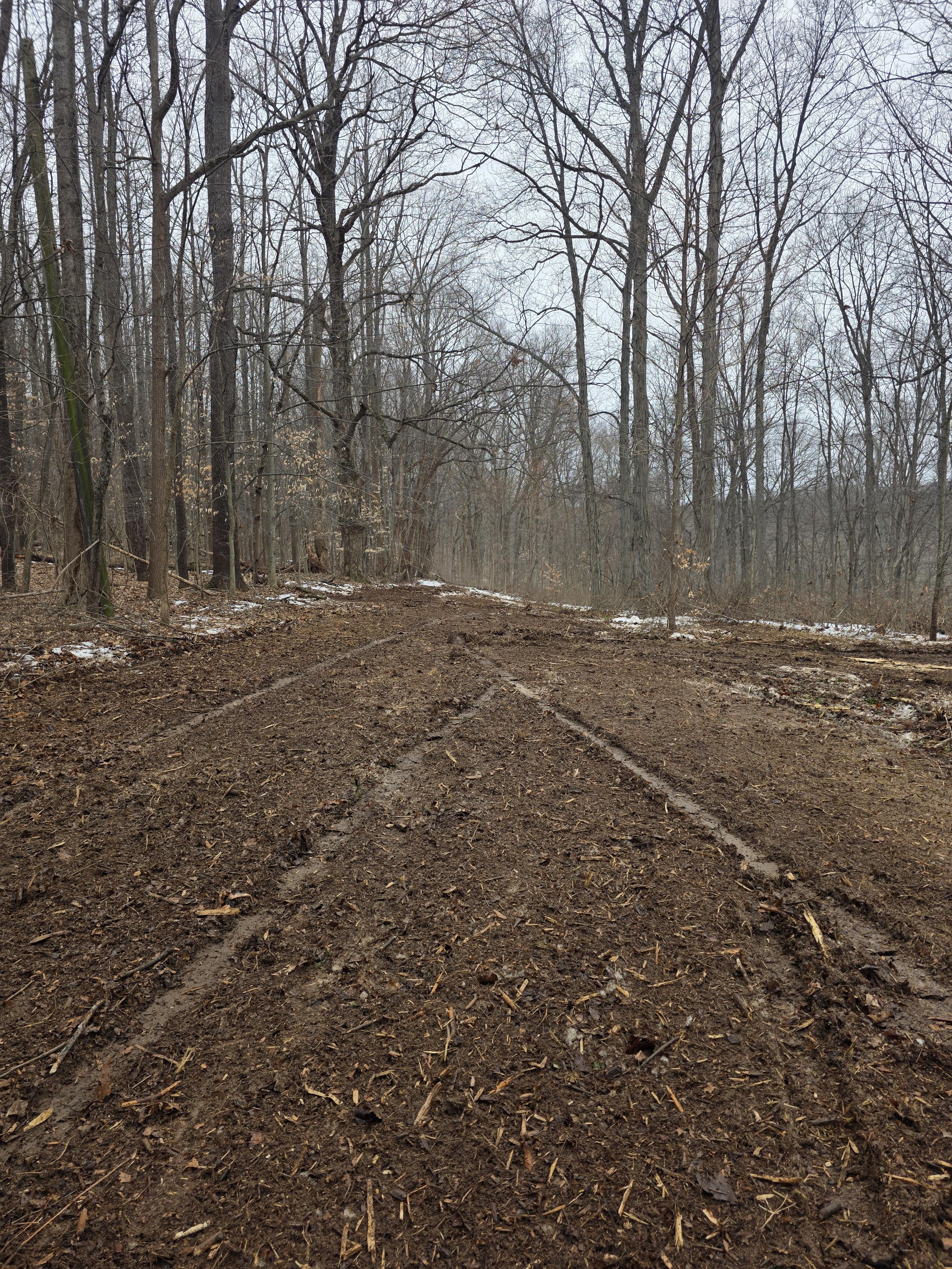 A couple of large machines that are on a hill