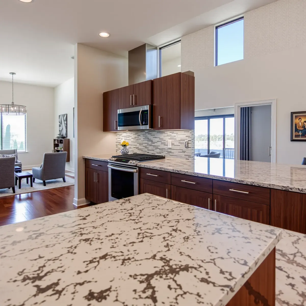 Modern Irvine home interior with a renovated kitchen, bright lighting, and stylish decor.