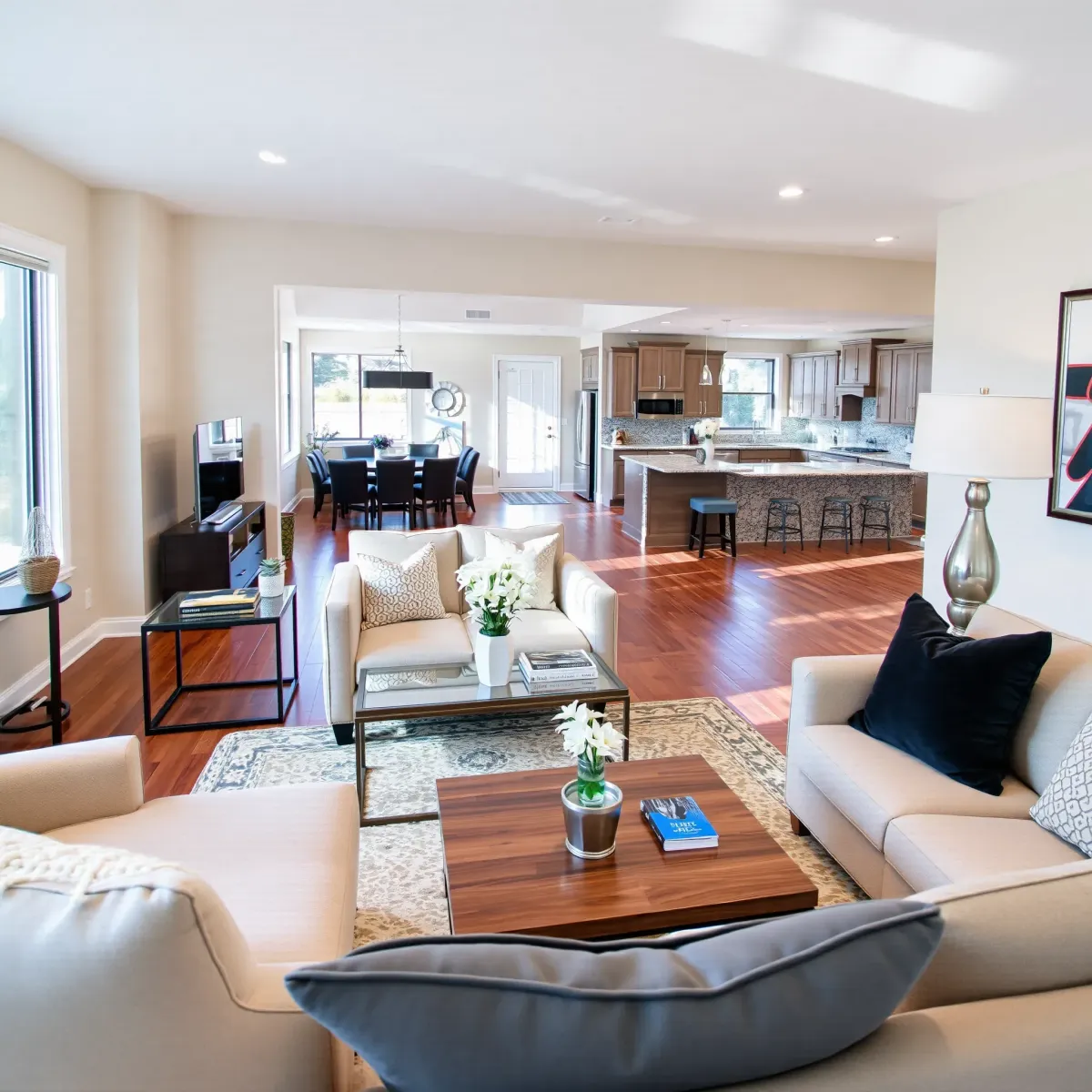Modern Lacy, CA home undergoing renovation with new windows, construction tools, lush greenery, and bright sunlight.
