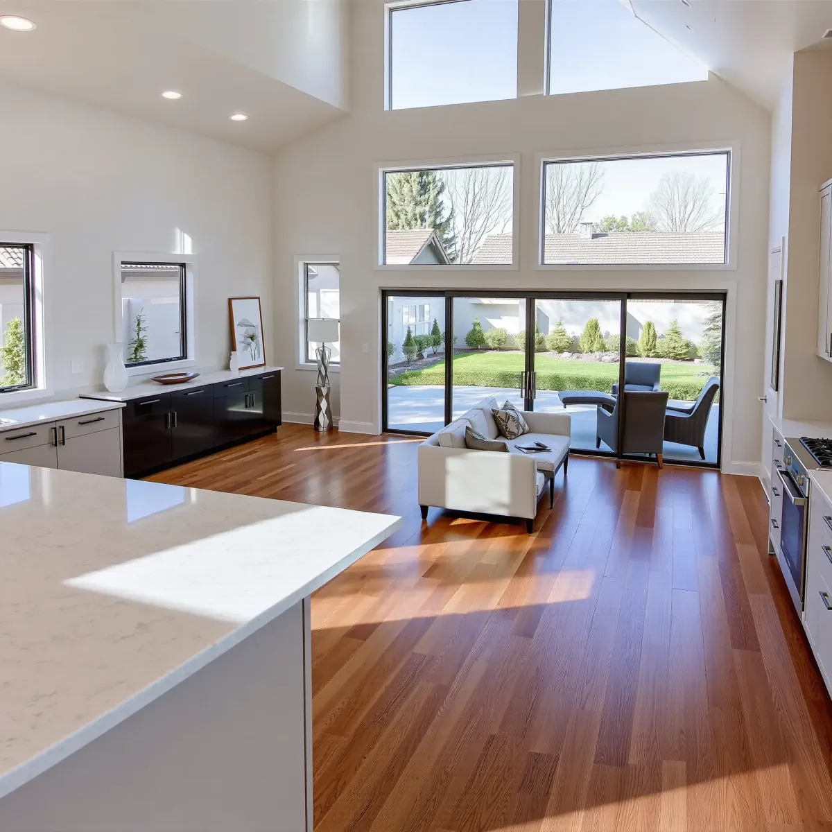 Beautiful renovated MainPlace, CA home interior with open living, hardwood floors, modern kitchen, and outdoor patio.