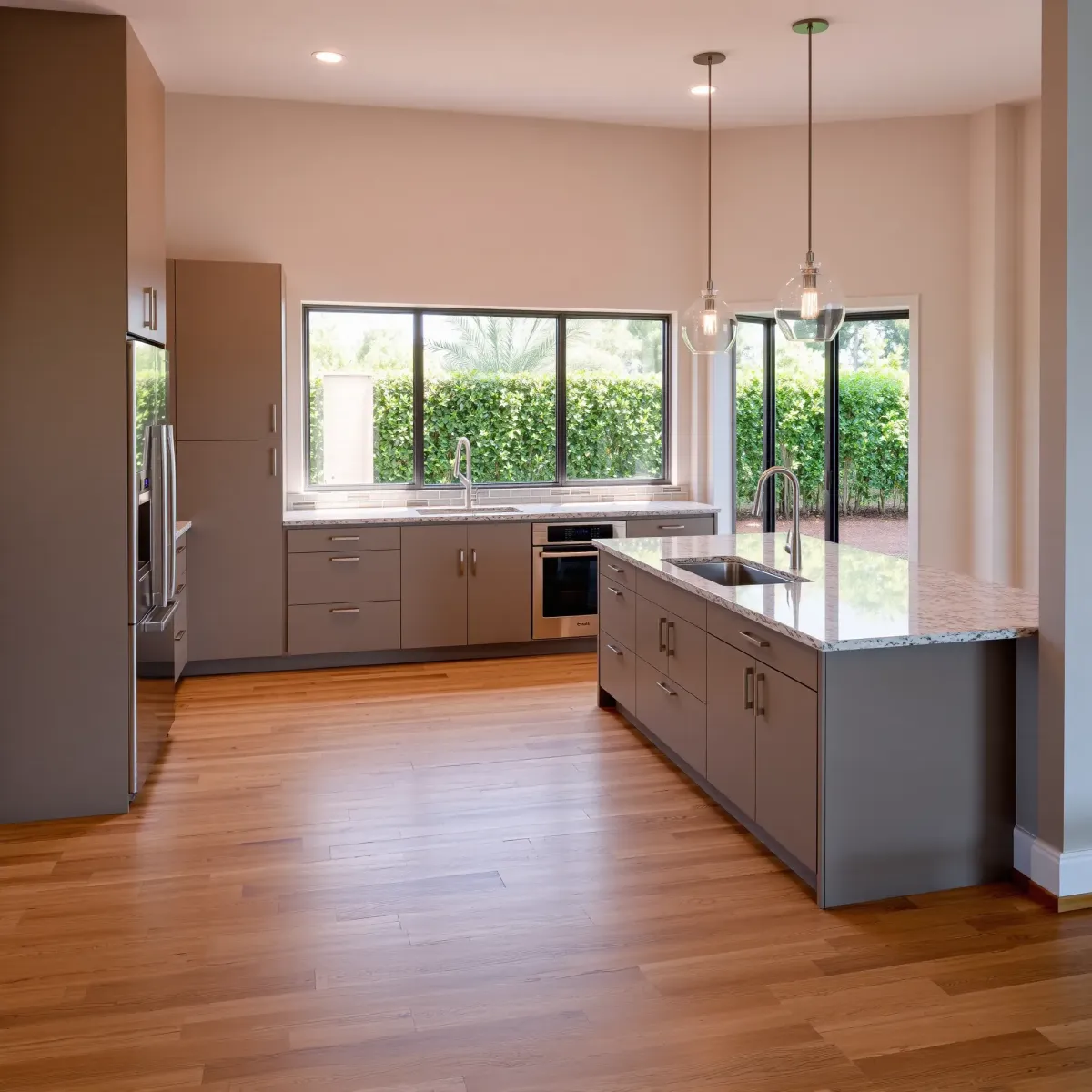 Remodeled Santa Anita Park kitchen with modern matte cabinets, stainless steel appliances, quartz counters, and scenic garden views.